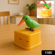 Close-up view of bird toothpick dispenser showing press-type toothpick release
