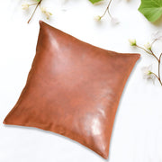 Stack of multiple pillow covers (60x60 CM) in different colors, ready for shipping.
