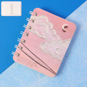 Mini spiral bound pocket notebook with cloud and moon artistic cover