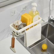 Side view of the Bathora kitchen sink organizer, showcasing its retractable design and drainage holes.