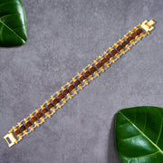 Close-up of a Golden Rudraksha Bracelet, highlighting the intricate bead details and golden accents.