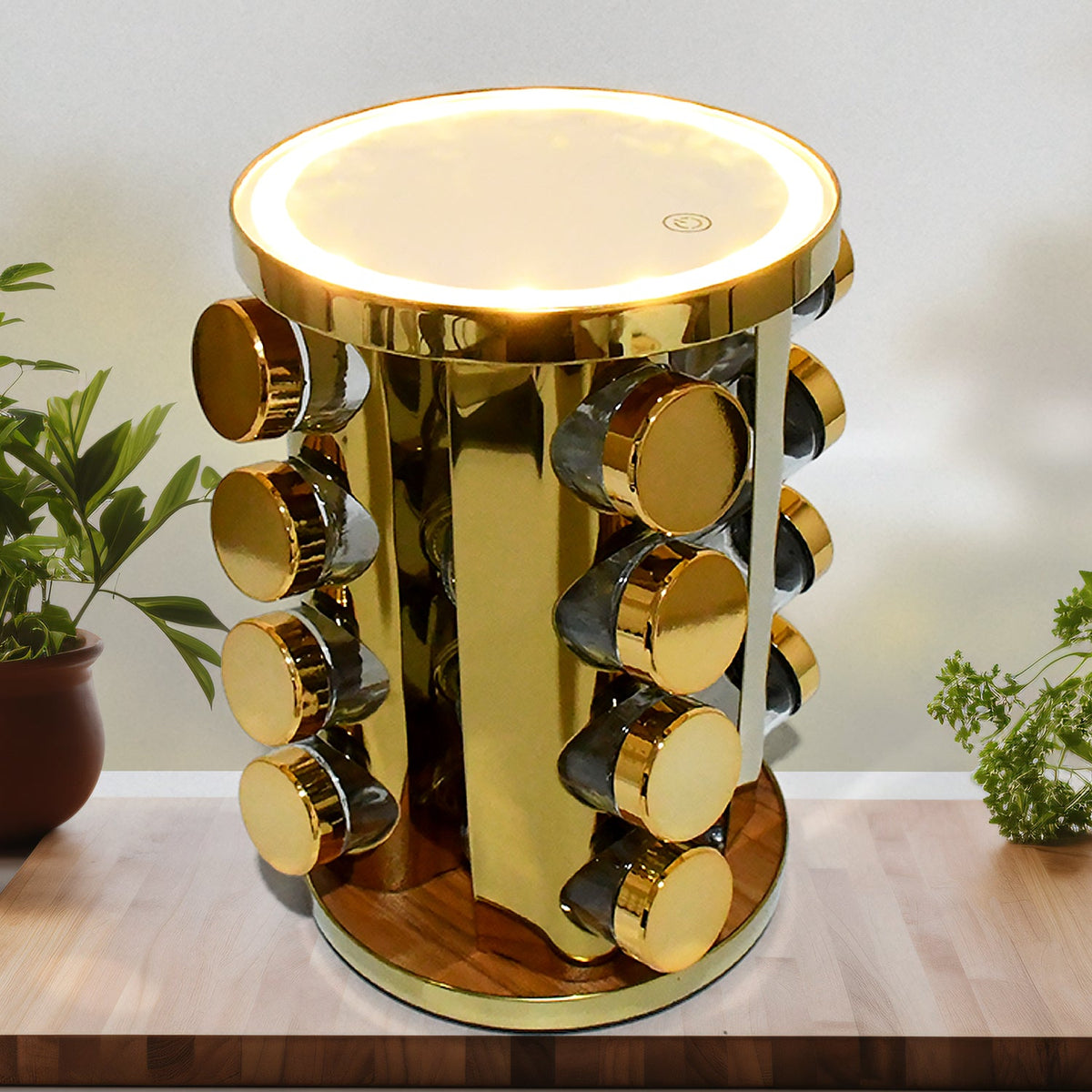 Side view of the golden LED rotating spice rack filled with seasoning jars.