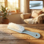 Handheld cleaning brush with soft bristles for effective household surface cleaning