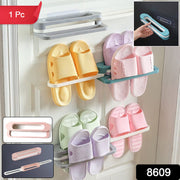 Compact wall mounted footwear rack organizing sandals and slippers