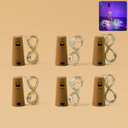 Cork-shaped LED bottle fairy lights in a wine bottle creating colorful ambient light