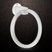 Clear ABS towel ring installed on a bathroom wall, holding a neatly folded white hand towel.