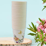 Group of disposable paper cups with a focus on their unique designs.
