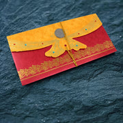 Elegant money gift cover featuring a festive pattern, ideal for auspicious occasions.
