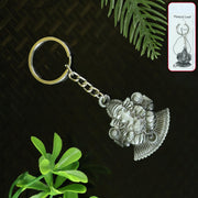 Lord Ganesha keychain with silver metal finish, front view