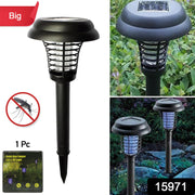 Solar powered UV LED mosquito zapper light illuminating outdoor area