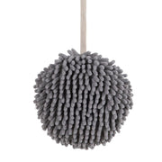 Plush hanging hand towel with convenient loop for easy placement.