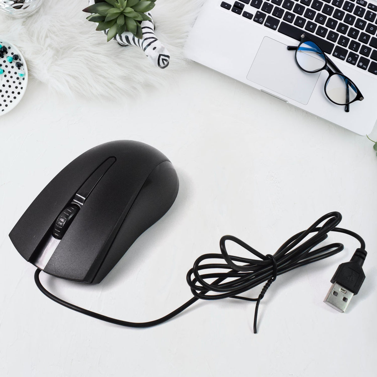 Compshop X2 Wired Optical Mouse with its sleek design on a clean white background.