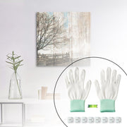 Contents of the picture hanging kit arranged on flat surface