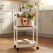Storage organizer trolley showing three spacious open shelves