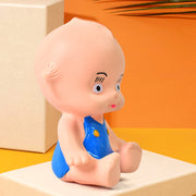 The colourful milk bottle rubber bath toy included in the Aditi squeeze toy set.