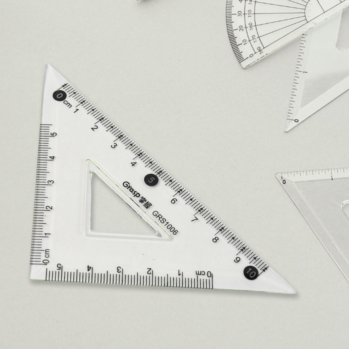 Angle measurement protractor from 4-piece transparent geometry set