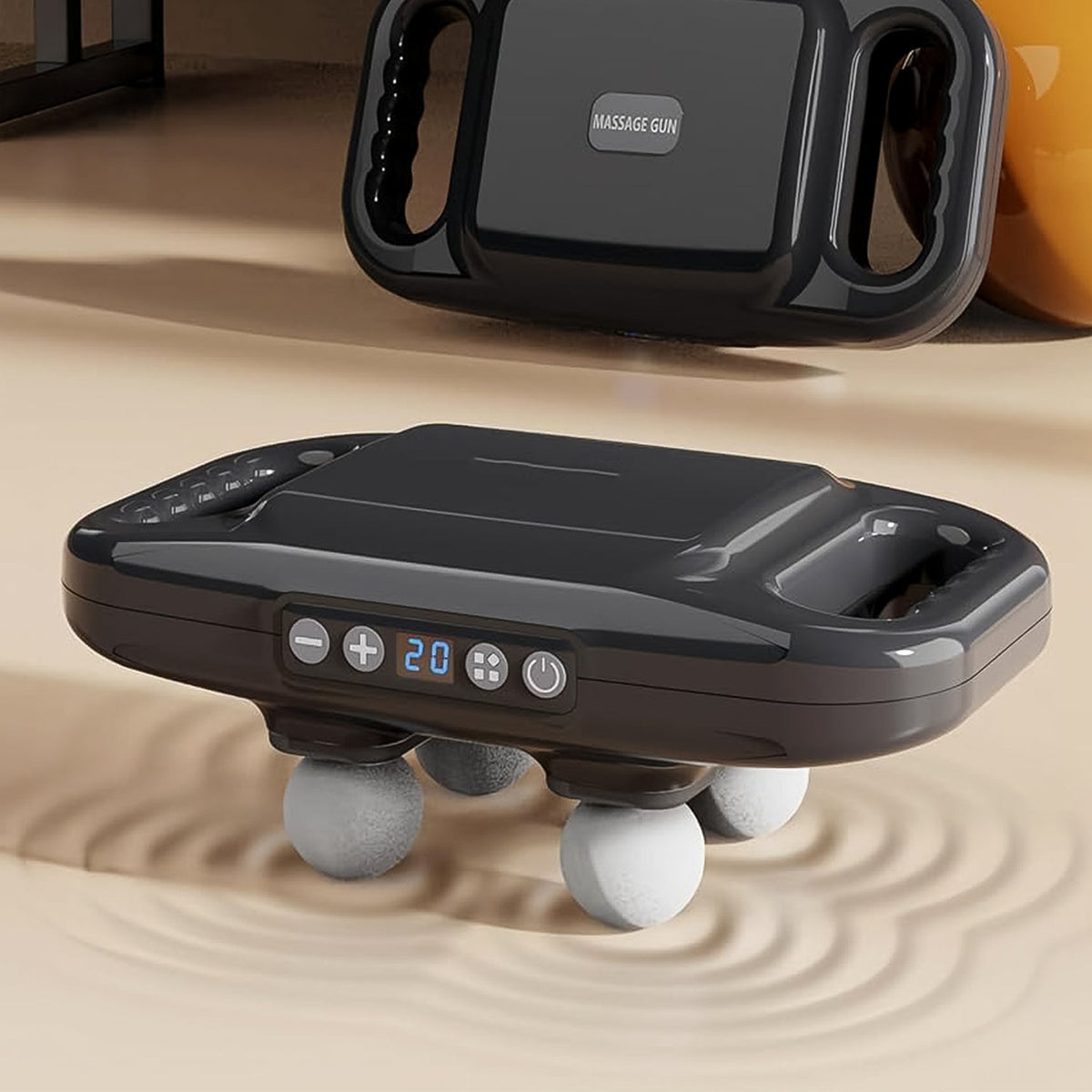 Close-up of the LED display and control buttons on the portable massage gun.