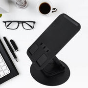The foldable phone holder extended, demonstrating its height adjustment capabilities for comfortable viewing.