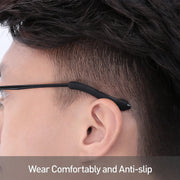 Anti-slip silicone eyeglass ear grips fitted on black-framed glasses, viewed from the side.