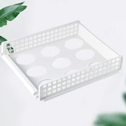 Clothes Organizer board with neatly folded shirts.