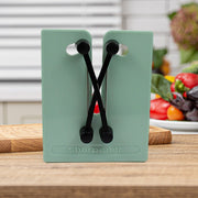 Side view of the versatile kitchen knife sharpener with sharpening slots.