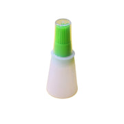 Ergonomic basting brush integrated with a clear silicone oil bottle.