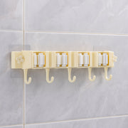 Self-adhesive broom and mop holder rack mounted on wall with utility hooks
