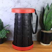 Folded telescopic stool showing compact disc shape for easy storage