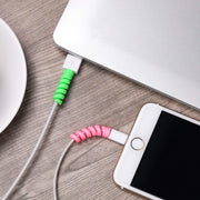 Assorted spiral cable protectors in a 4-pack, ideal for charger cable saving.