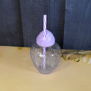 Lightweight plastic cup with a secure lid, showcasing its portable design.