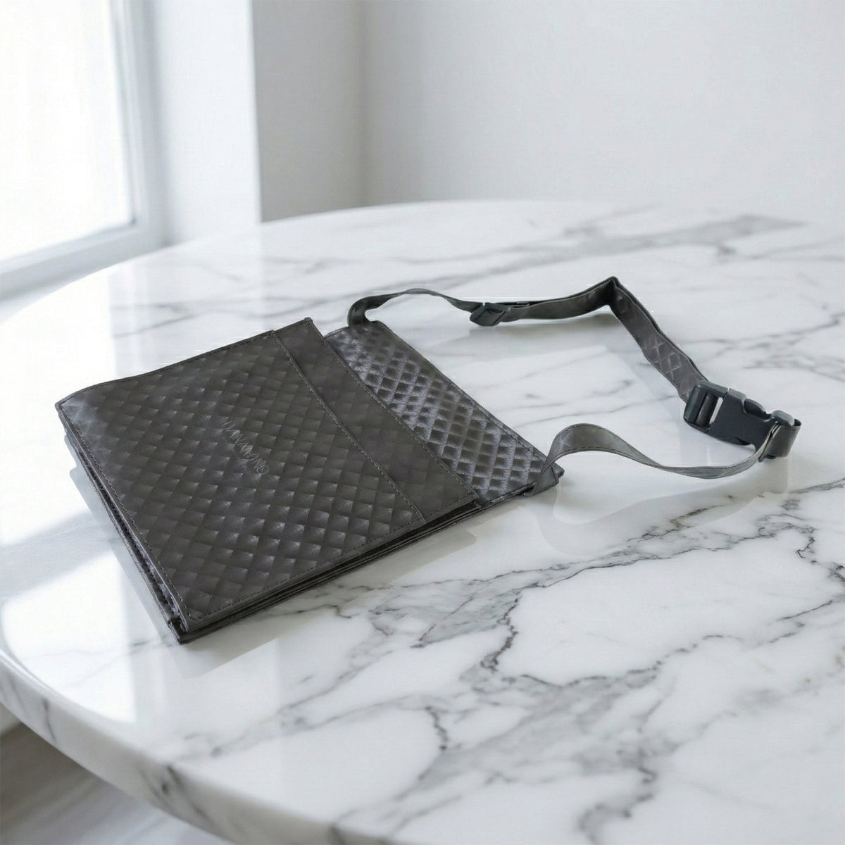 Lightweight quilted travel crossbody bag with spacious compartment