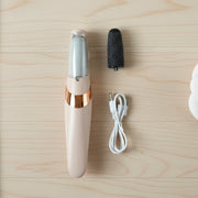 Side view of the portable Flewless Pedi electronic pedicure device, perfect for travel.