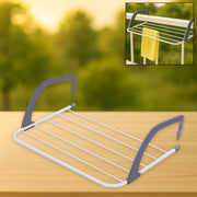 Sturdy metal folding drying rack from Indo Glow, ready for use.