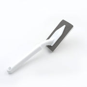Multi-surface triangle cleaning tool for various household chores.