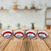 Side view of ceramic cup and glass bowl set arranged neatly