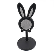 The Bunny Phone Stand in a home office setting, perfect for desk organization.