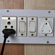 Multiple views of the large electric socket safety covers.