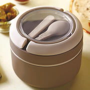 Close-up of the airtight lid of the insulated lunch box, demonstrating its secure seal.
