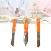 The Quickslice peeler efficiently removing skin from a fresh fruit for easy preparation.