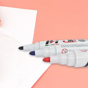 Set of three whiteboard markers with fine tips and a board eraser