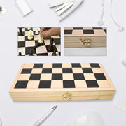 A game in progress on the elegant folding wooden chess set, showing the chessmen on the board.