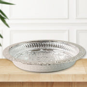 Decorative plastic pooja thali featuring silver finish and floral embossing