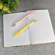 CustoPen smooth writing ball pen gliding across paper, illustrating smudge-free ink.