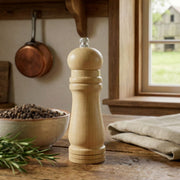 Elegant wooden pepper mill offering smooth manual grinding for fresh peppercorns