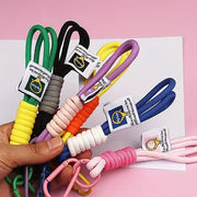 Assortment of colourful phone wrist straps, ideal for mobile phones and keys.
