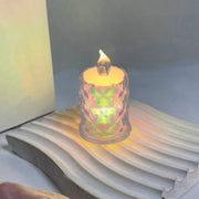 The 4-piece flameless LED candle set illuminates a dark setting, creating a festive atmosphere.