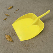 Side view of the sturdy long handle dustpan construction.