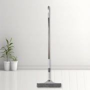 Close-up of the 2-in-1 window cleaning squeegee head with brush and rubber blade