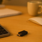 USB OTG adapter plugged into a tablet, demonstrating its plug-and-play functionality.