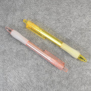 A pair of CustoPen ballpoint pens displayed with essential office stationery.